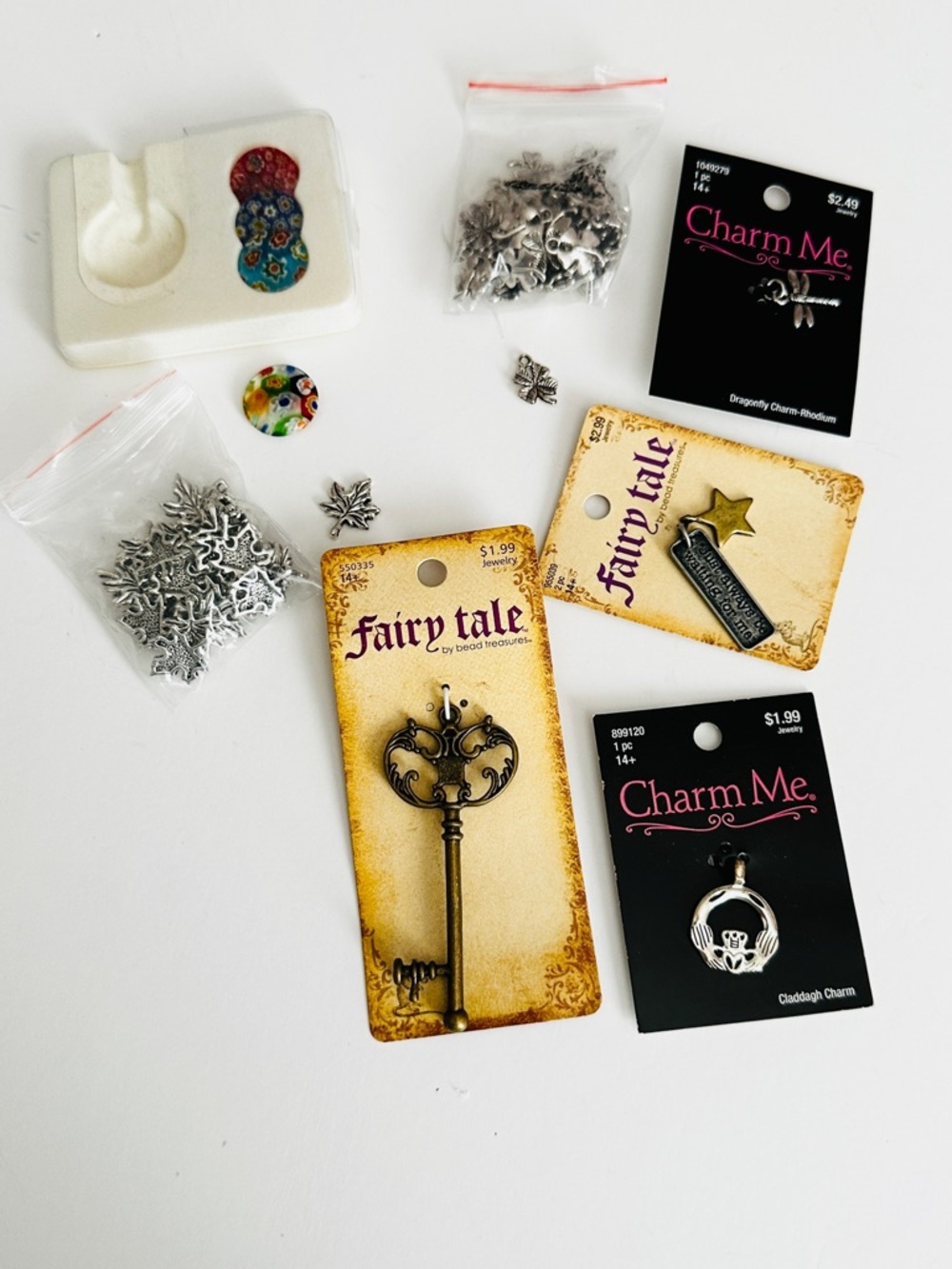 Lot #12 Assorted Metal Charms & Key Pendant - Silver & Antique Brass Tones